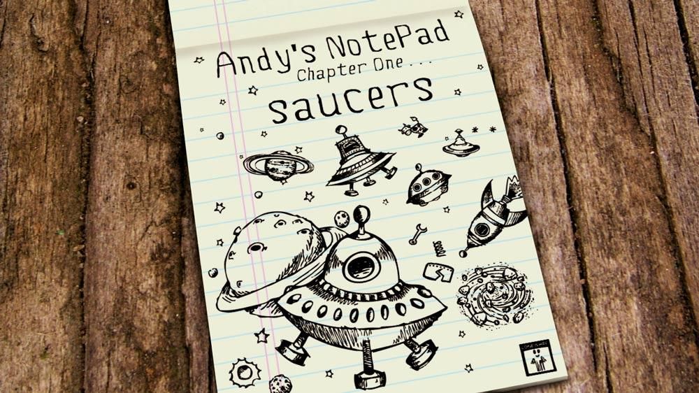Andy’s Notepad Saucers cover art on a wooden desk